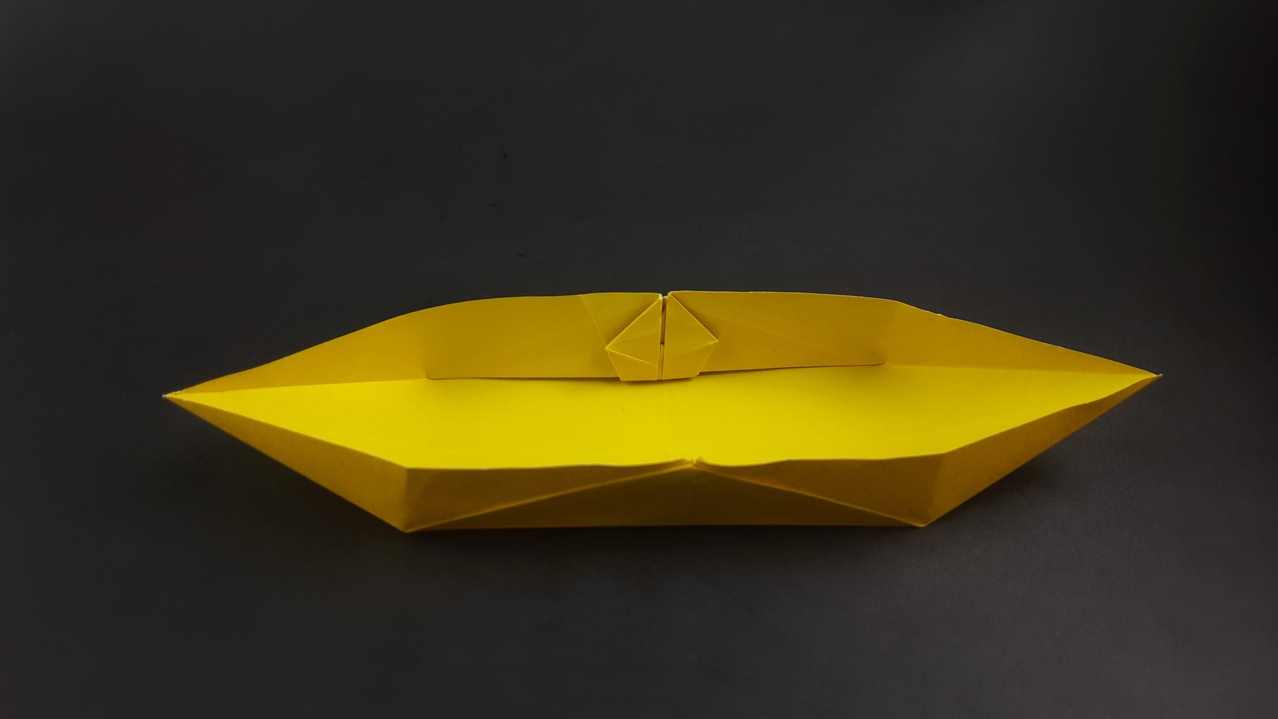 Final product for how to make an origami boat that floats tutorial.