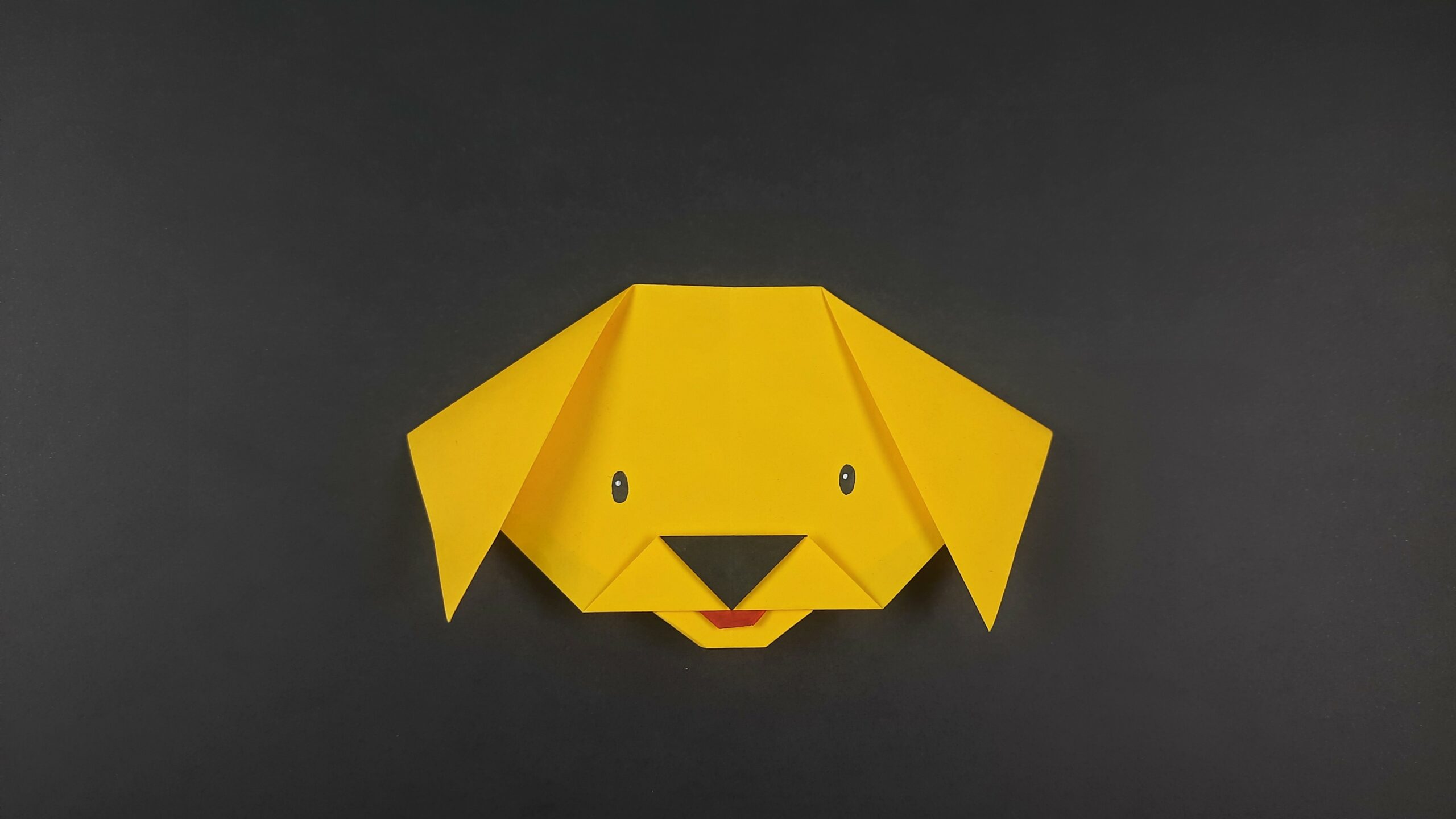 Final result for origami dog face instructions.