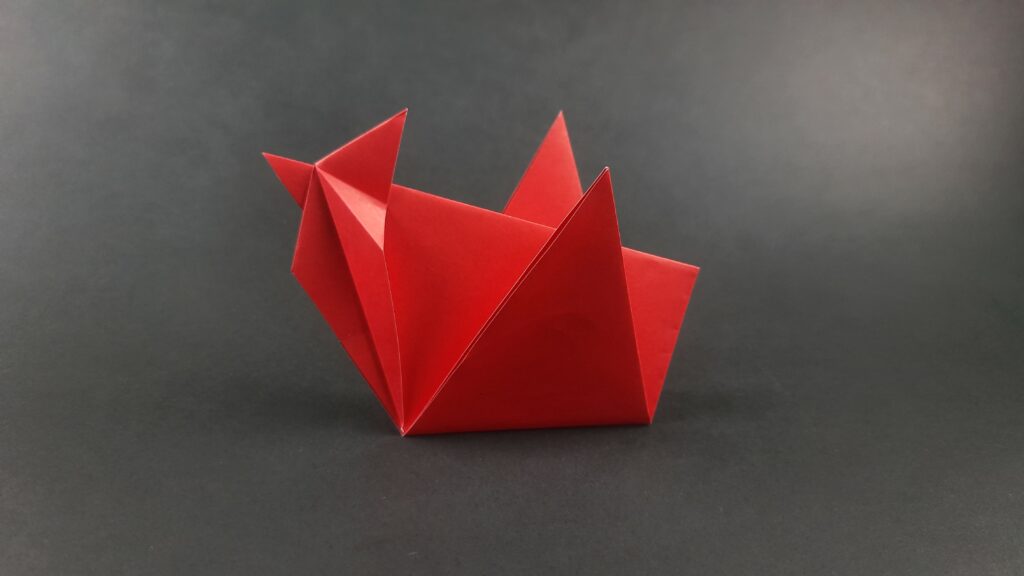 Final result for how to make an origami chicken instructions.